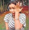 Tamanna hangs up the phone.