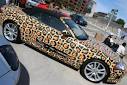 Weird looking car that has leopard print custom paintjob on Weird ...