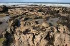 erosion where its cement is calcareous and therefore soluble in water. - via Daymix
