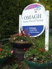 H4772 : Omagh, County Town of Tyrone sign. near to An Oghmagh, Ireland - via Daymix