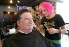 Mayor Gary Bric gets a cut from stylist Natalie Wegner at Floyd