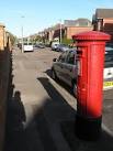Looking along Limited Road, a small residential street, from its western end - via Daymix