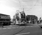 It is 'Balloon' double decker No 719, decorated as the Walls Ice Cream tram, - via Daymix