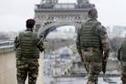 In pics: Snipers, helicopters turn French town into warzone.