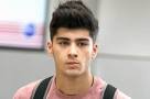 Zayn Malik bandaged up with mystery hand injury after cheating ...