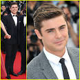 Zac Efron arrives with a smile