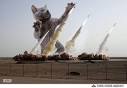 cat riding a missle