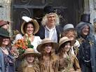 A wedding group taken outside - via Daymix