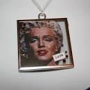 pendant in a chrome frame.
