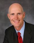 Rick Scott signed a controversial teacher merit pay bill into law Thursday ... - rick-scott