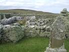 Gravestones not only surround but are also within the walls of the ruined - via Daymix