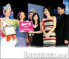 ... with Kyle Tinga, Cory Quirino and last year\u0026#39;s winner Crystal Gallardo, award the Mutya ng Taguig 2009 crown to gorgeous Bea Candaza. Requesting content. - pic-06050702190598