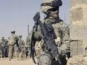 Us Army Soldier Armed with a Mk 48 Light Machine Gun Provides