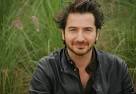 Jonathan Zaccaï (in a theater,