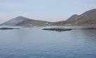 The nearest skerry is Sgeir Mhic Coma, and beyond it is Sgeir an Arbhair, - via Daymix