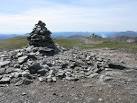 Another cairn at the far end of the summit and Loch Lomond visible beyond - via Daymix