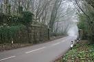 The railway used to run here. This stonework on either side of the road is - via Daymix