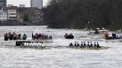 Passing Chiswick, the Dark Blues of Oxford hold a narrow lead; Cambridge are - via Daymix