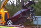 Rowan Atkinson escapes death with a broken shoulder after McLaren ...