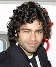 Here comes Adrian Grenier
