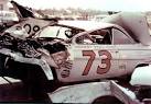 Johnny Beauchamp's Chevy after sailing over the wall with Lee ...