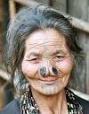the huge nose plugs worn