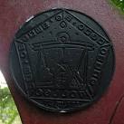 It represents the zodiacal sign of Libra. National Cycle Network Mileposts - via Daymix