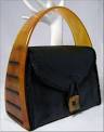 http://cf.ltkcdn.net/handbags/images/std/35440-289x367-40s_lucite_leather.jpg
