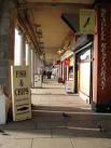 Shops, Madeira Drive. Under the colonnade near the Aquarium. - via Daymix