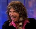 Steven Tyler with feather hair