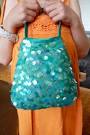 http://www.dinneralovestory.com/wp-content/uploads/2010/05/sequined-handbag.jpg