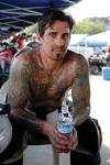 http://xtattoos.net/wp-content/uploads/2010/03/Tattoos-On-Carey-Hart.jpg