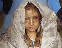 Sahar Gul being brought to a