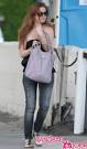 http://handbagdujour.com/wp-content/uploads/2009/08/isla-fisher-coach-parker-slim-tote-in-mauve.jpg