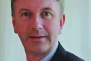 McAfee picks ex-Adobe head to