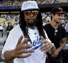 Taylor Lautner and Lil Jon indulge their bromance at baseball game