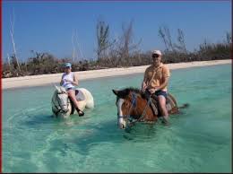 Riding on the beach
