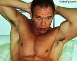wet man swimming sauna gay