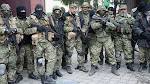 Ukraine army, pro-Russian rebels swap prisoners under tattered.
