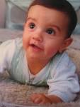 File:<b>Infant</b> looking at shiny