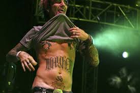 Celebrity Tommy Lee With Writing Tattoo