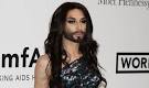 Eurovision winner Conchita Wurst makes a glittering appearance at.