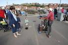 Puppeteer, Whitby. A street entertainer amuses the passers-by. - via Daymix