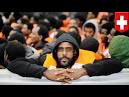 Italy picks up 700 boat migrants, says rescue operations ongoing.