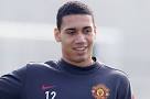 So unlucky: Chris Smalling has suffered a new blow - Chris+Smalling+of+Manchester+United+in+action+during+a+first+team+training+session+at+Carrington+Training+Ground