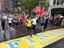 Thousands run final mile of Boston Marathon