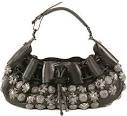 http://www.pursepage.com/wp-content/uploads/2008/03/burberry-leather-warrior-bag-1.jpg