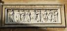 Here on the front of the building, men are seen pursuing suitably manly - via Daymix