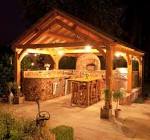 Outdoor Kitchens Ideas in Wooden Gazebo at Night with Lovely ...