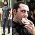 Milo Ventimiglia Sports Fake Tattoos, Scruffy Beard, and Long Hair.